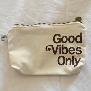 Sun Bum Cream Pouch with Brown Text